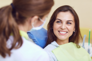 a patient smiling during their dental visit